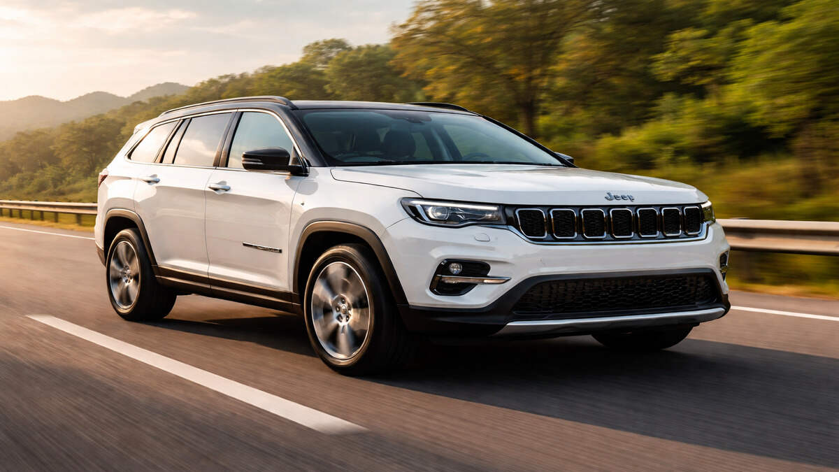 Pearl White Jeep Meridian on Indian highway