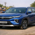 Toyota Urban Cruiser Hyryder parked on an Indian town road in daylight